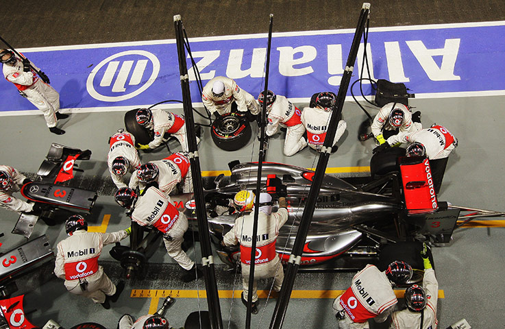 Singapore Grand Prix: The nose cone of Lewis Hamilton's car is swapped after a collision