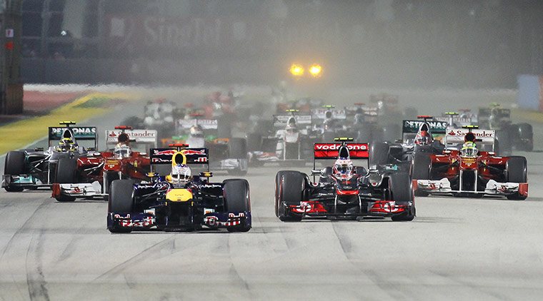 Singapore Grand Prix: Sebastian Vettel leads the pack as they pull away from the starting grid