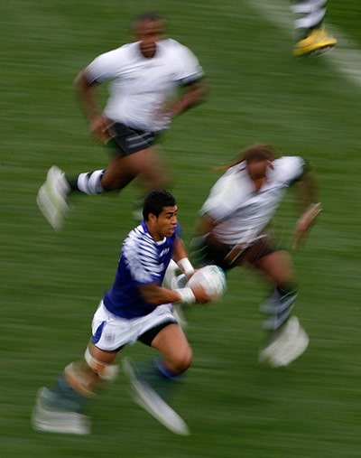 Fiji v Samoa: Samoa's George Pisi runs at the Fiji defence