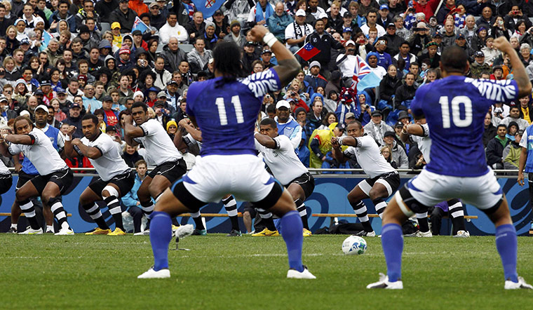 Fiji v Samoa: Fiji players perform the Cibi whilst the Samoa players perform the Siva Tau