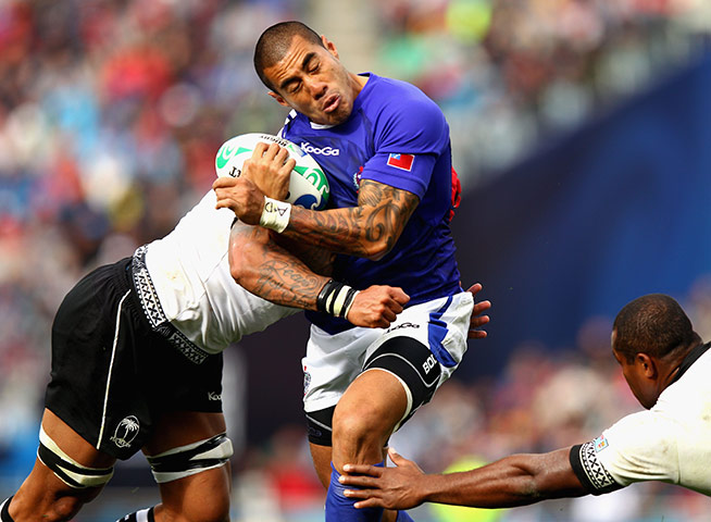 Fiji v Samoa: Fiji's Netani Edward Talei tackles Samoa's Tusi Pisi 