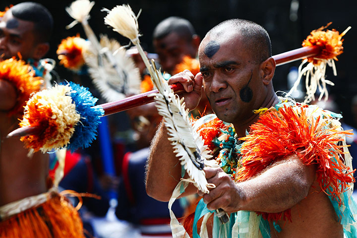 Fiji v Samoa: Dancers perform with the Fijian Police band