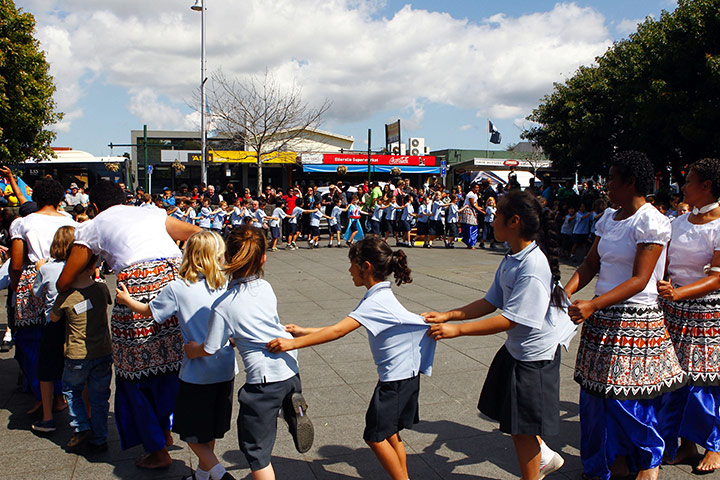 Fiji v Samoa: Dancers and local school children dance to the Fijian Police band
