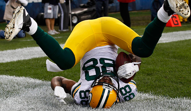 NFL roundup: Green Bay Packers' tight end Jermichael Finley celebrates his touchdown