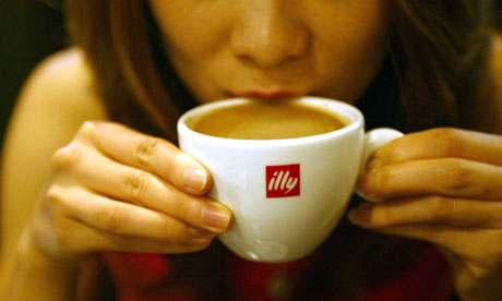 A woman drinking coffee