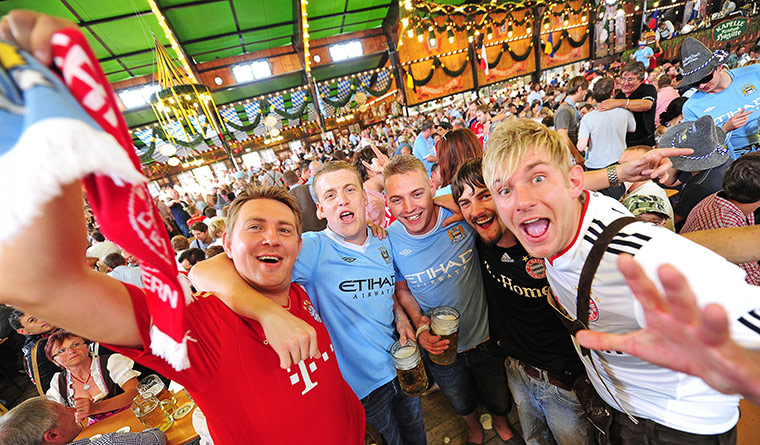 Champions League Tuesday: Manchester City & Bayern Munich fans at the Oktoberfest in Munich