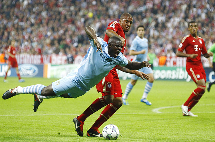 Champions League Tuesday: Man City's Micah Richards is sent sprawling by Bayern's Jerome Boateng
