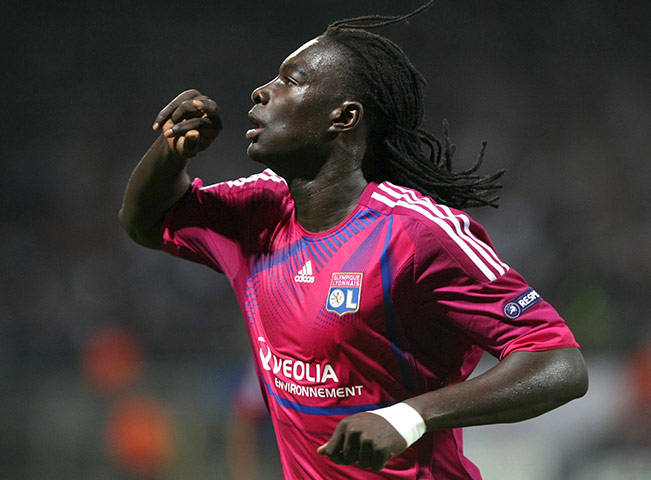 Champions League Tuesday: Lyon's Bafetimbi Gomis celebrates after scoring against Dinamo Zagreb
