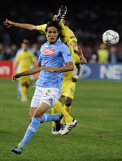 Champions League Tuesday: Napoli's Edinson Cavani tussles with Villarreal's Gonzalo Rodriguez