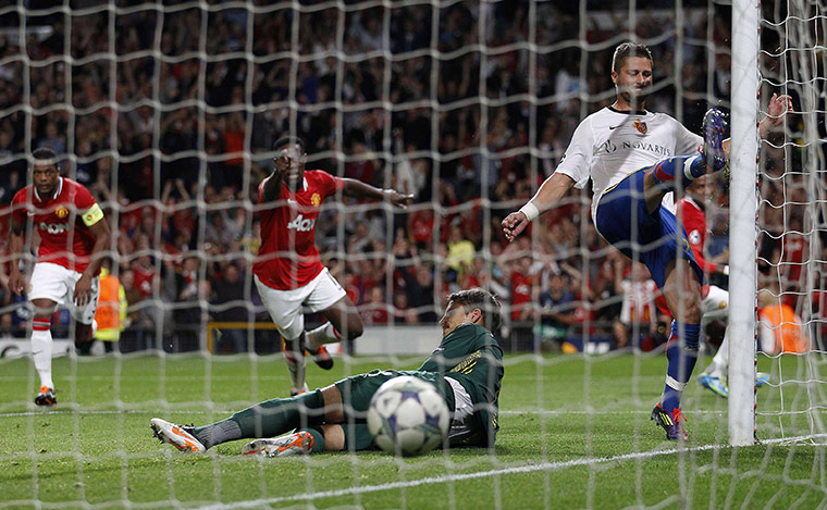 Champions League Tuesday: Basel's Steinhofer reacts after Manchester United's Ashley Young equalises