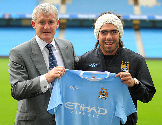 footy: Argentinian footballer Carlos Tevez (R)