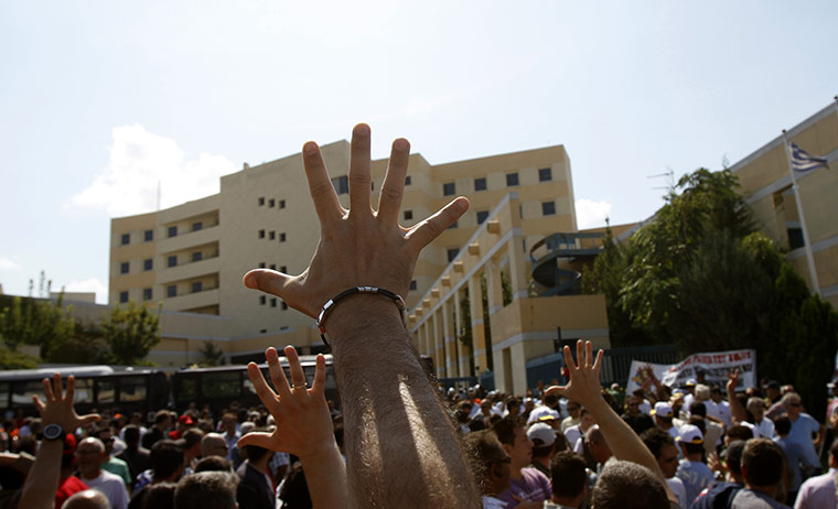 24 hours in pictures:  A protesting taxi driver Athens, Greece