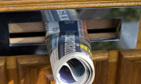 The Guardian newspaper in a letterbox