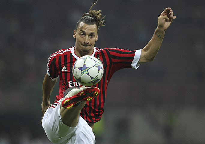 Champions League Wed: AC Milan's Zlatan Ibrahimovic controls the ball against Plzen