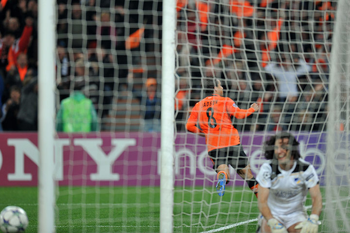 Champions League Wed: APOEL Nicosea's Dionisios Chiotis reacts after Shakhtar's Jadson scores