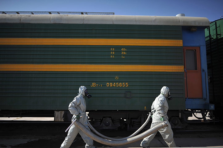 China space launch: Staff prepare for the launch of the Tiangong-1 spacecraft, China