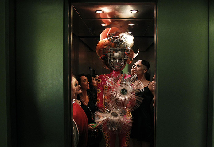Alternative Hair Show: Models enter a lift as they head for the stage