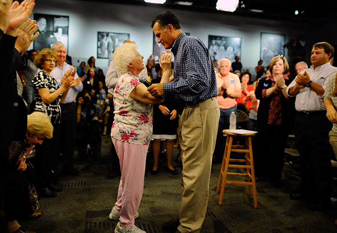 24 horus in pictures: Republican Candidate Mitt Romney talks in Goffstown