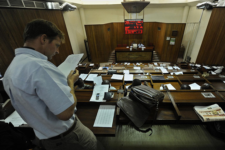 Coffee in Kenya: Coffee traders attend a bean auction 