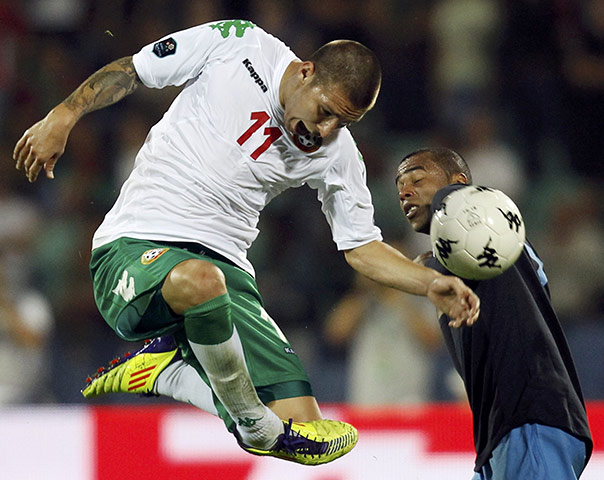 Bulgaria v England: Ashley Cole battleswith Bulgaria's Bandalovski 