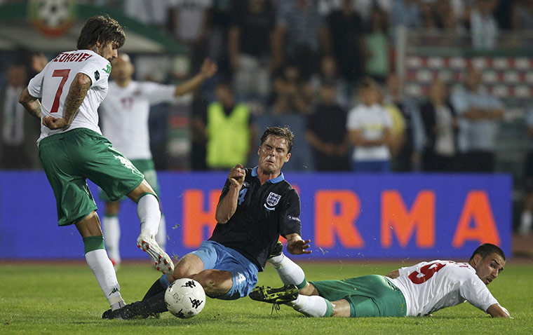 Bulgaria v England: Scott Parker takes on Bulgaria's Blagoy Georgiev, left, and Ivelin Popov