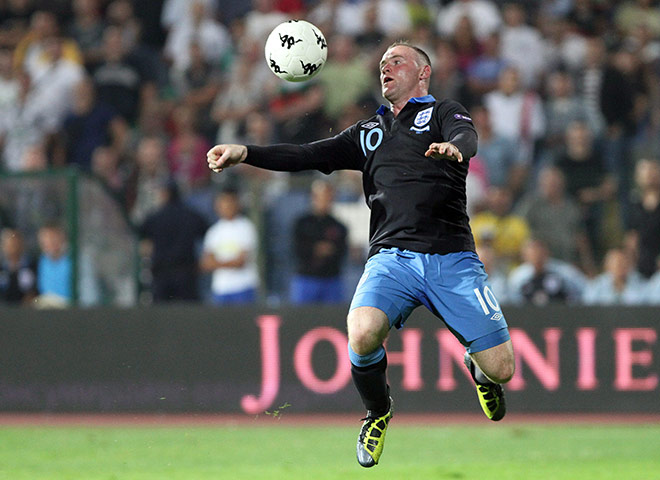 Bulgaria v England: Wayne Rooney controls the ball using his chese