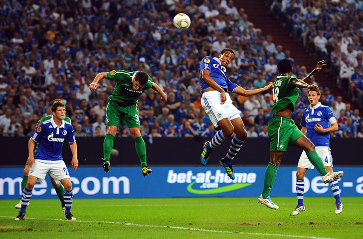Europa League: Schalke's Joel Matip outjumps the Maccabi Haifa defence