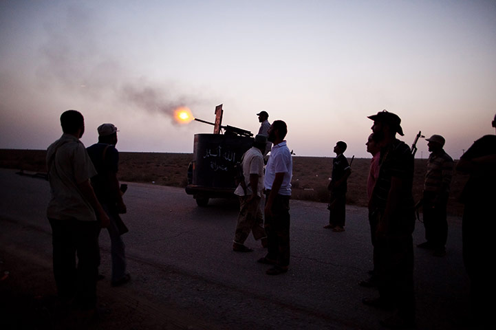 24 hours in pictures: A Libyan rebel soldier outside Bani Walid 