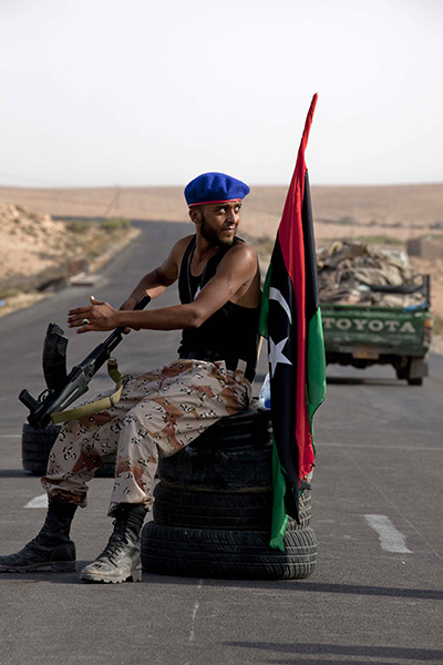 Sean Smith: Bani Walid: A rebel soldier at a checkpoint at Bostata 50km from Bani Walid