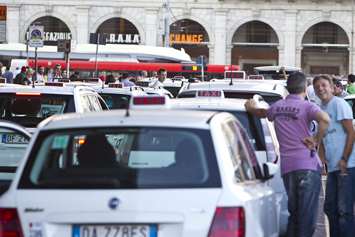 Italy strike: Line of taxis parked outside Termini Station during a day of general strike