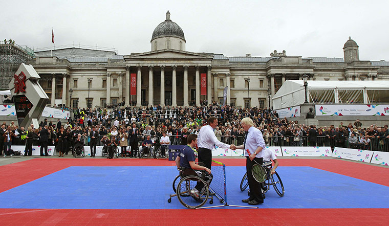 Cameron plays tennis : Cameron shakes hands with Johnson