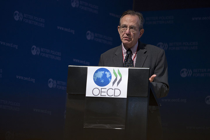 Week in Business: OECD Chief Economist, Pier Carlo Padoan, gestures during a press conference
