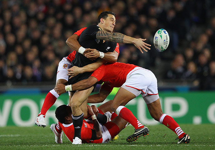 RWC game 1: Sonny Bill Williams is on the receiving end of a tackle
