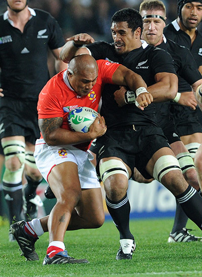 RWC game 1: Tonga's Alisona Taumalolo  vies with New Zealand's flanker Jerome Kaino 