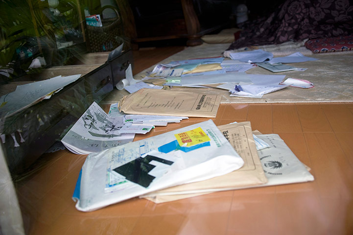 Return to Fukushima: Letters and other documents lie scattered on the floor, Fukushima 