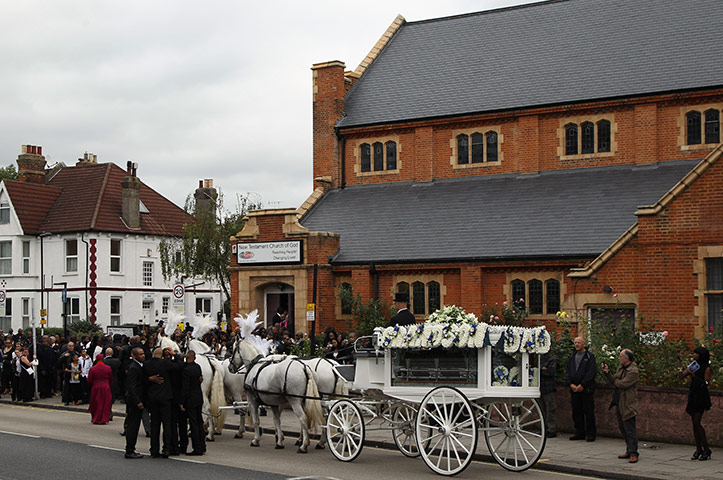 Funeral of Mark Duggan: The cortege arrives at the church