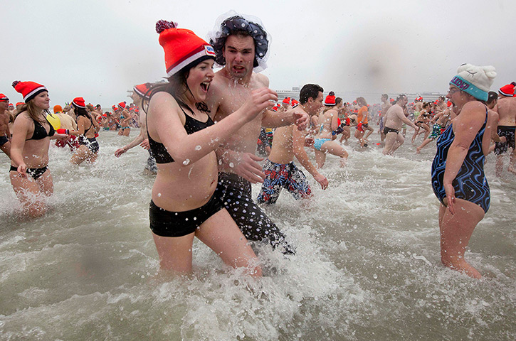 New Years day swimmers: Thousands celebrate the New Year at Scheveningen