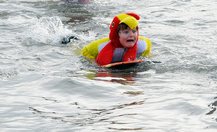New Years day swimmers: Swimmers take to the water for the annual dip in the South Bay, Scarborough