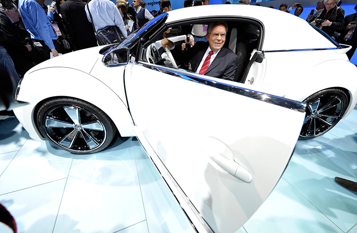 Detroit Auto show: Dr. Ulrich Hackenberg sits in the VW E-Bugster
