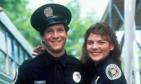 kim cattrall police academy. Steve Guttenberg and Kim Cattrall in the first Police Academy film (1984).