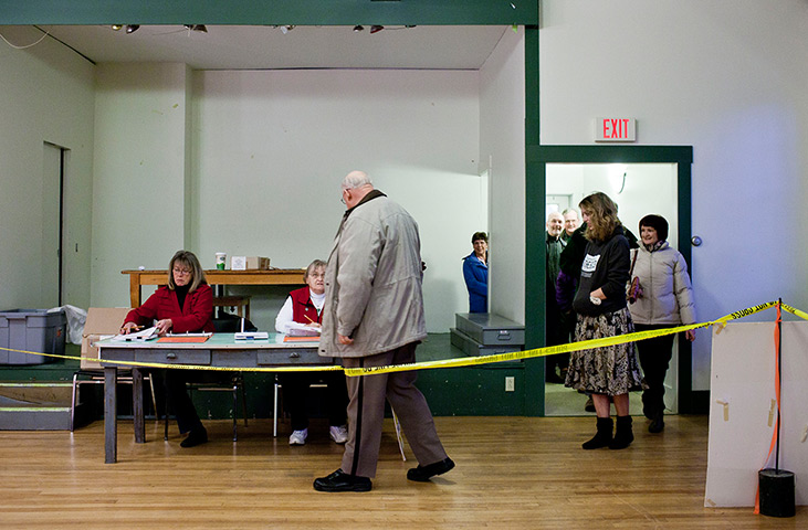 New Hampshire primary: New Hampshire voters file in to the Old Town Hall in Canterbury