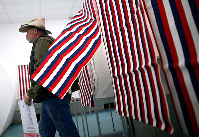 New Hampshire primary: A man exits a booth after voting at Deerfield Town Hall