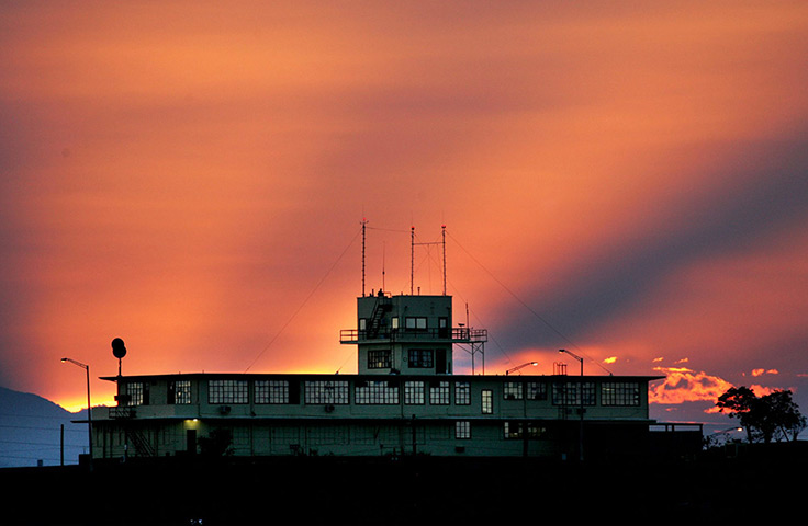 Inside Guantanamo: the sun sets behind the Commissions building where hearings are held, 2004 
