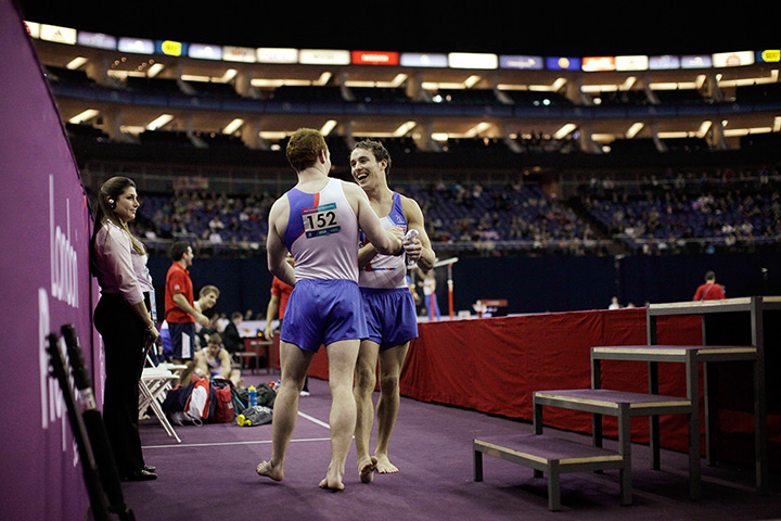 24 hours in pictures: Gymnasts Daniel Keatings and Daniel Purvis greet after a Olympic test
