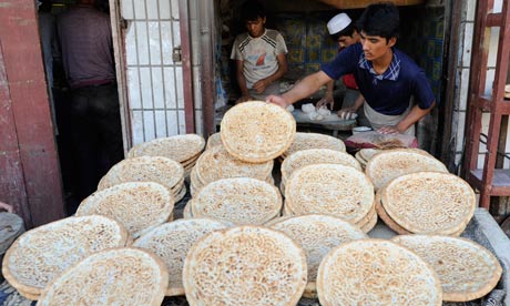Letter china naan Daily bread bakers making flatbread in Kashgar 