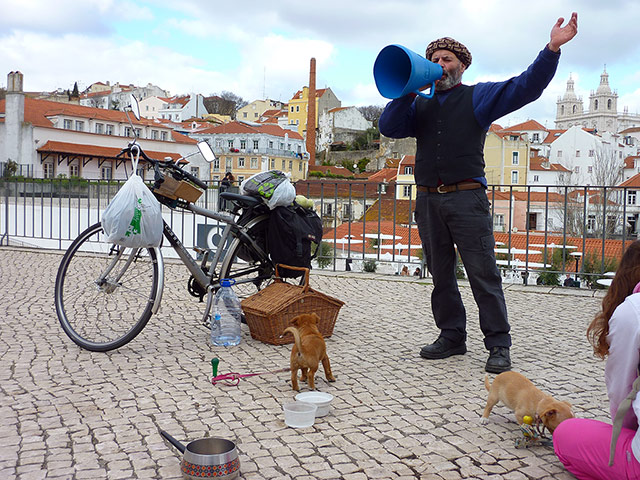 In pictures: : Street singer in the old part of Lisbon