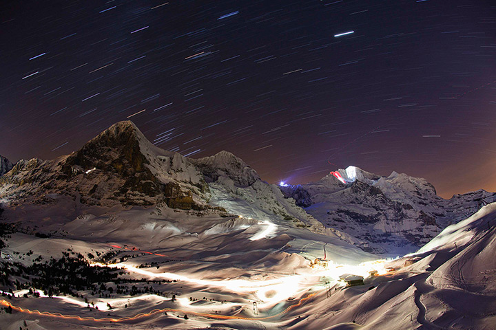 24 hours in pictures: A giant light installation illuminates north face of the Jungfrau mountain