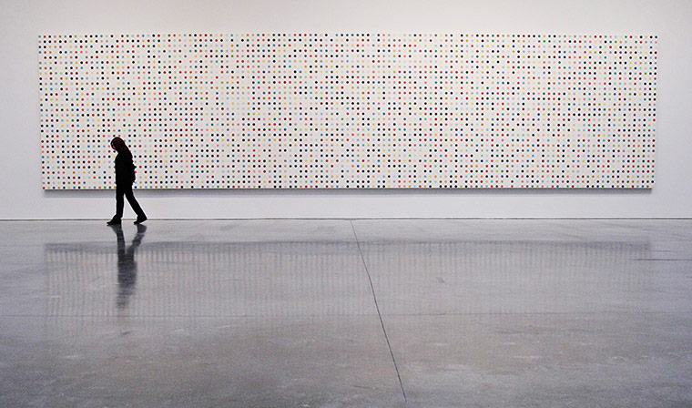 Hirst at Gagosian Gallery: A visitor to the press preview of Damien Hirst: The Complete Spot Paintings