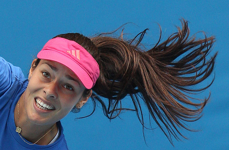 Sport pics of the week: Ana Ivanovic serves during practice ahead of the 2012 Australian Open