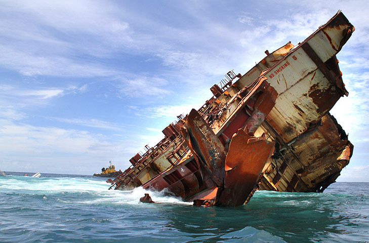 24 hours: Tauranga, New Zealand: The stern section of stricken container ship 'Rena'